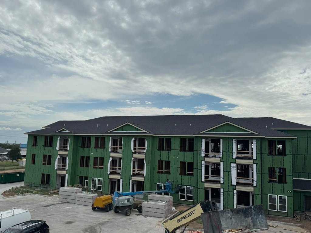 Apartment complex roof under construction, Houston area